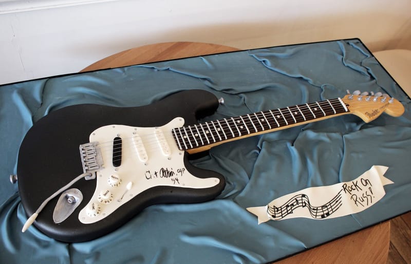 Sculpted guitar birthday cake