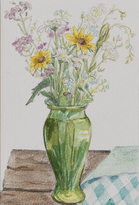 Wildflower centerpiece on picnic table